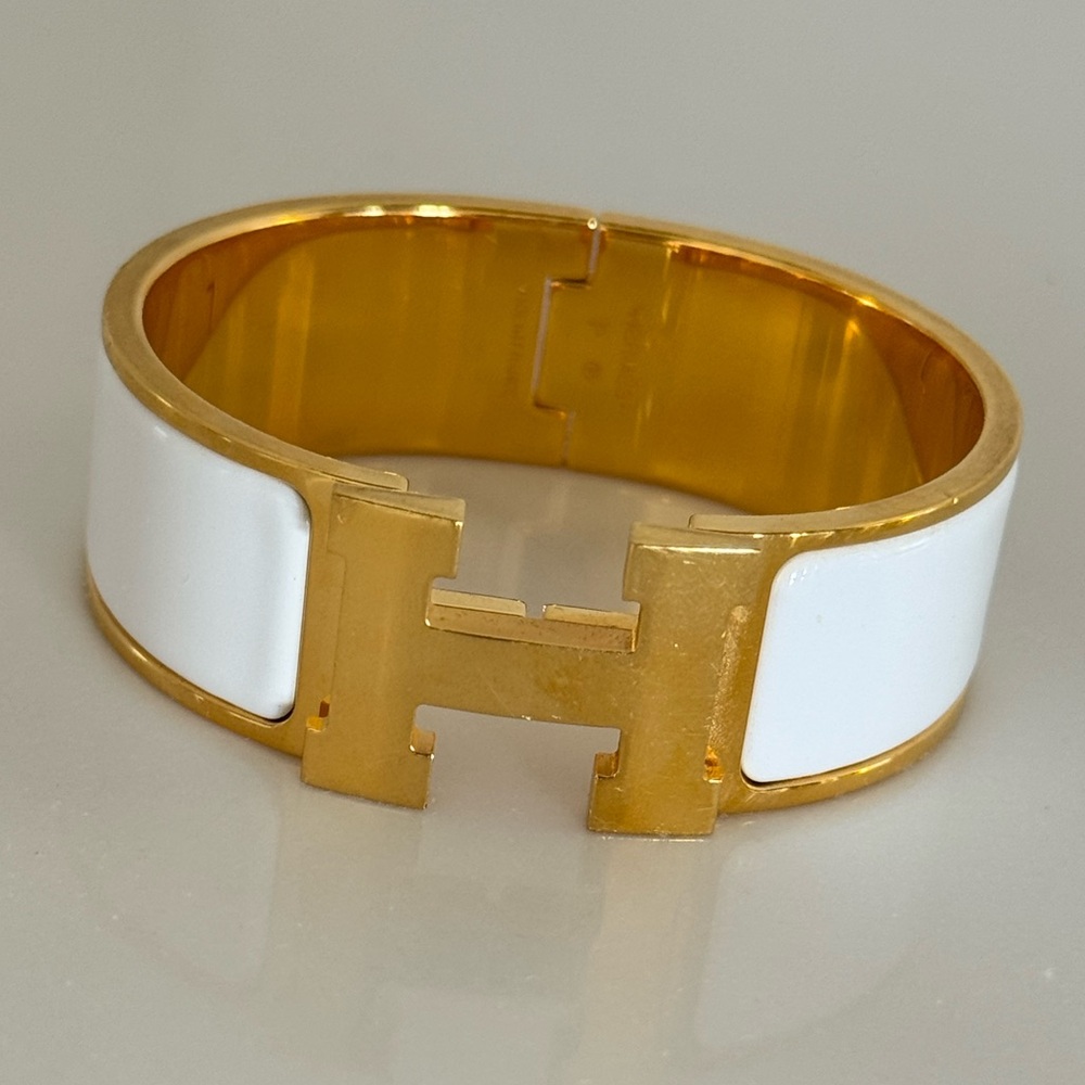 SOLD! Hermes Gold Bracelet with Logo